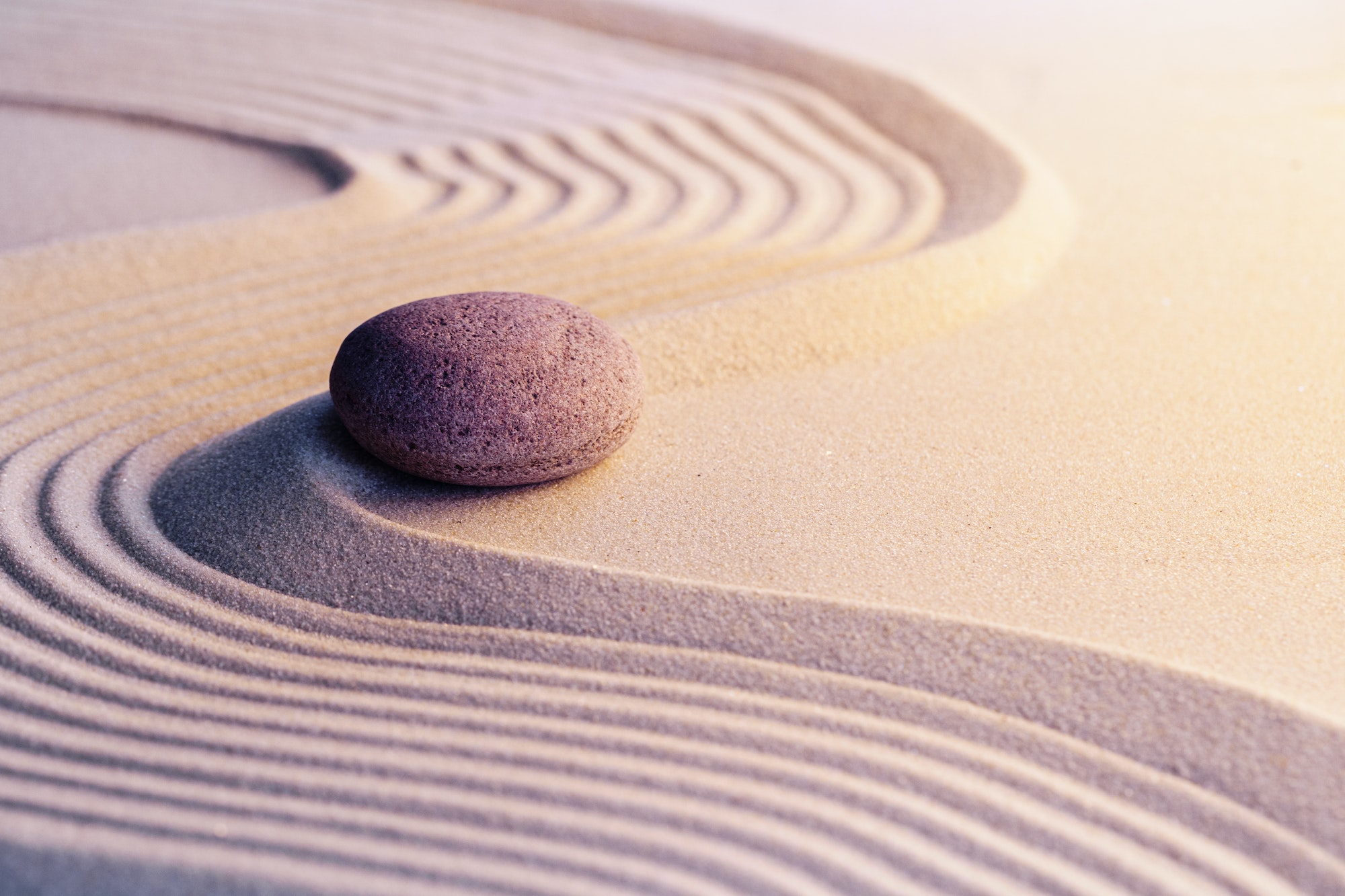 Meditation zen garden with stones on sand